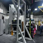 Máquina Granalladora De Cinta Rotativa Modelo ET-160 Y Cargador Para Piezas De Fundición De Hierro