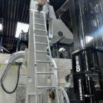 Máquina Granalladora De Cinta Rotativa Modelo ET-160 Y Cargador Para Piezas De Fundición De Hierro